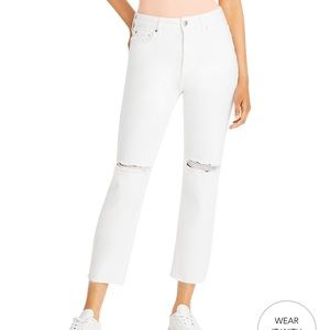 High rise cropped straight leg jeans with rips on the knees
